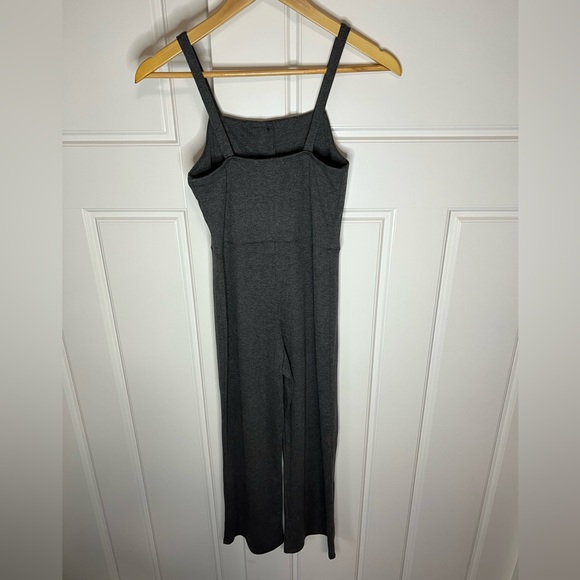 Gray, cropped/ankle jumpsuit with straight leg. Thin straps and button down top. - Picture 10 of 10